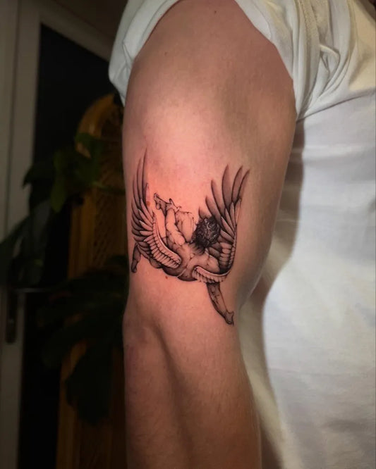 Medium Black and Grey Icarus with Angel Wings on Men Arm Tattoo by @georgina.tattoos