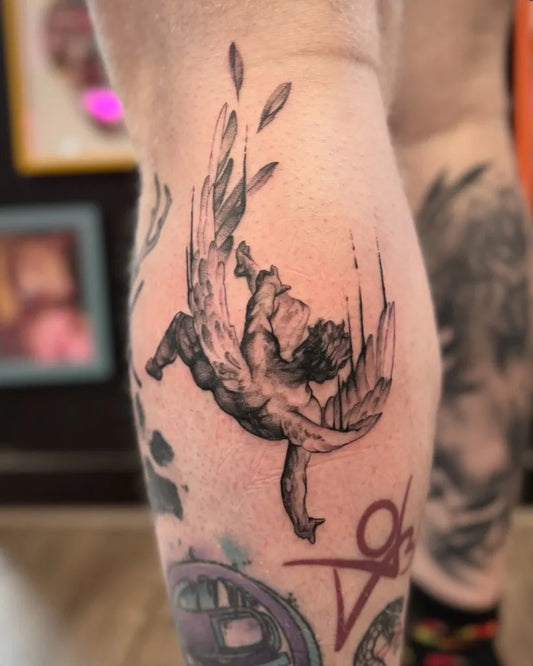 Medium Black and Grey Icarus with Wings on Men Leg Tattoo by @georgilouisetattoos