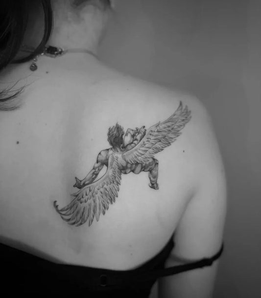 Medium Black and Grey Icarus with Wings on Women Shoulder Tattoo by @izztheartist
