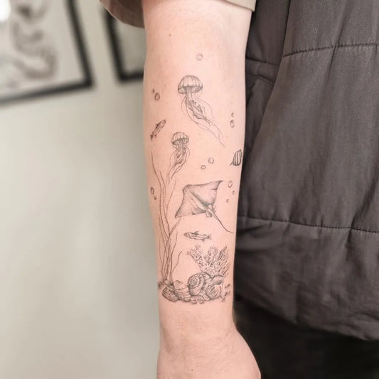 Medium Black and Grey Jellyfish Manta Ray Tattoo on Men Arm by @tp.tattoos