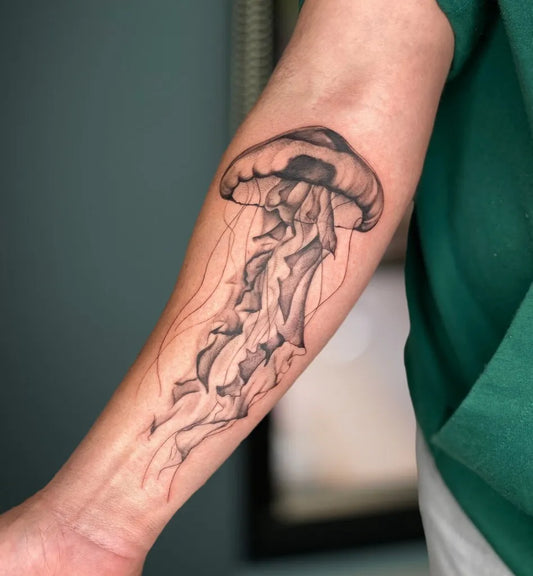 Medium Black and Grey Jellyfish Tattoo on Men Arm by @blacklines_tattoostudio
