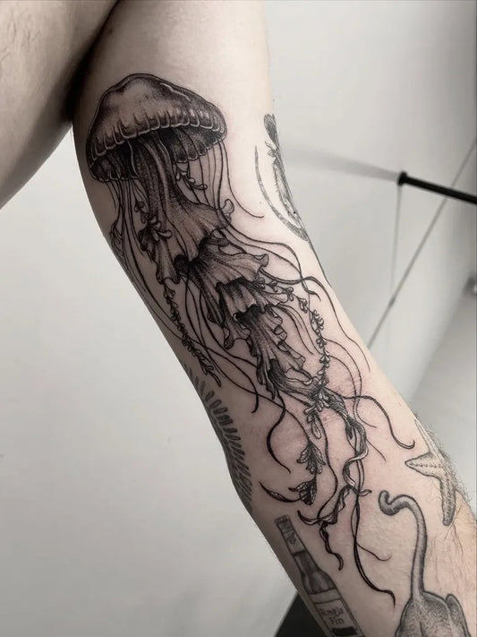 Medium Black and Grey Jellyfish Tattoo on Men Arm by @jaimeejay.tattoo