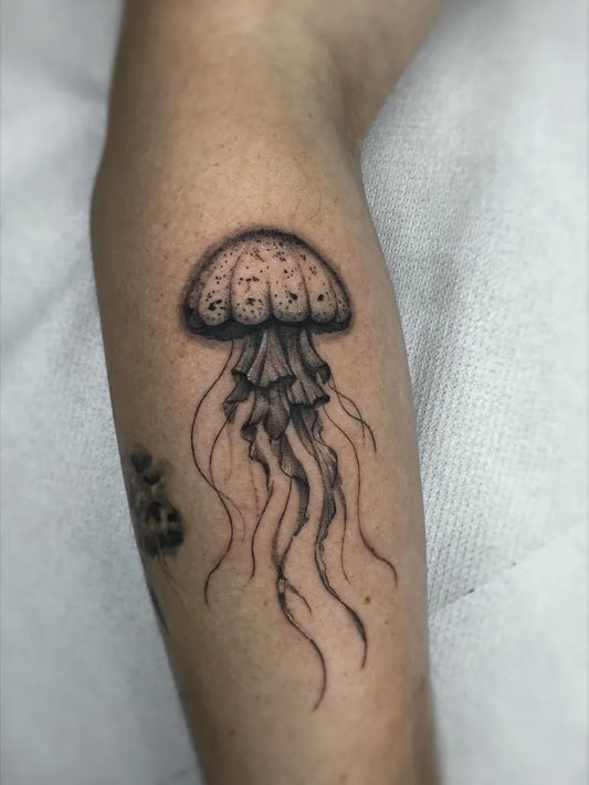 Medium Black and Grey Jellyfish Tattoo on Women Arm by @finelinetattooslondon