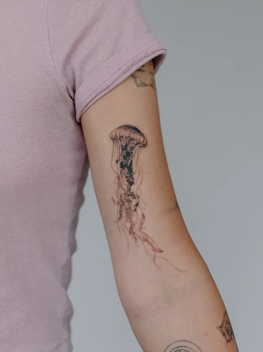 Medium Black and Grey Jellyfish Tattoo on Women Arm by @wolfdencustomtattoo
