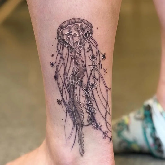 Medium Black and Grey Jellyfish and Flowers and Seastars Tattoo on Women Leg by @solstattoos