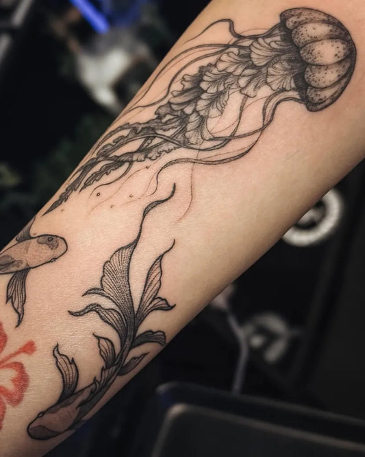 Medium Black and Grey Jellyfish and Koi Tattoo on Women Arm by @alaynasillustration