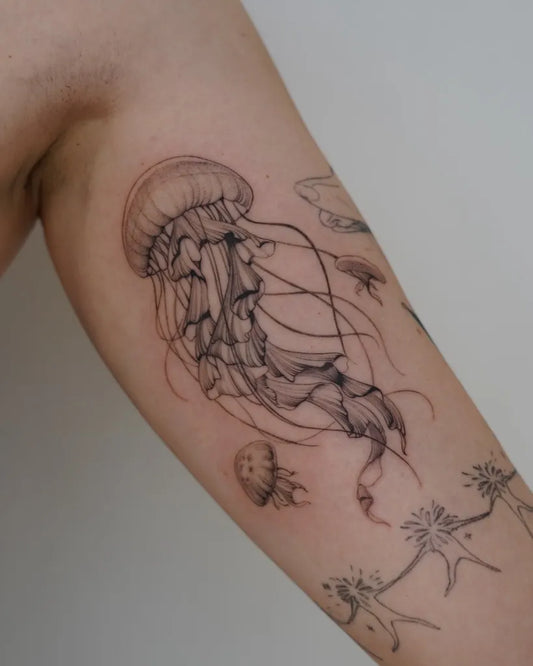 Medium Black and Grey Jellyfish and Sea Creatures Tattoo on Women Arm by @samtattooer