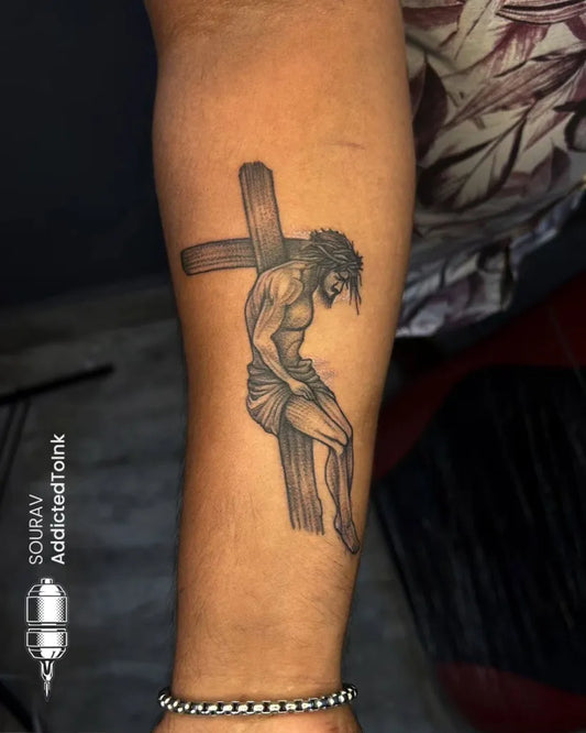 Medium Black and Grey Jesus on Cross Tattoo on Men Arm by @addic.tedtoink