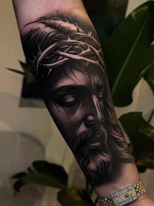 Medium Black and Grey Jesus with Crown of Thorns Tattoo on Men Arm by @devonfrancistattoos