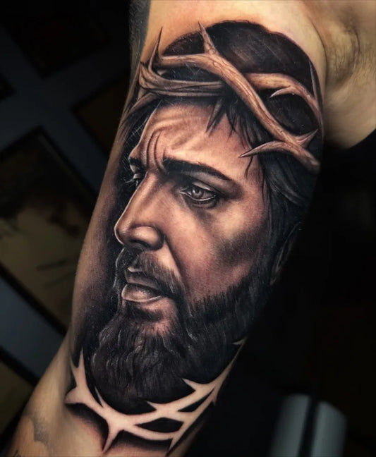 Medium Black and Grey Jesus with Crown of Thorns Tattoo on Men Arm by @liam.onemore