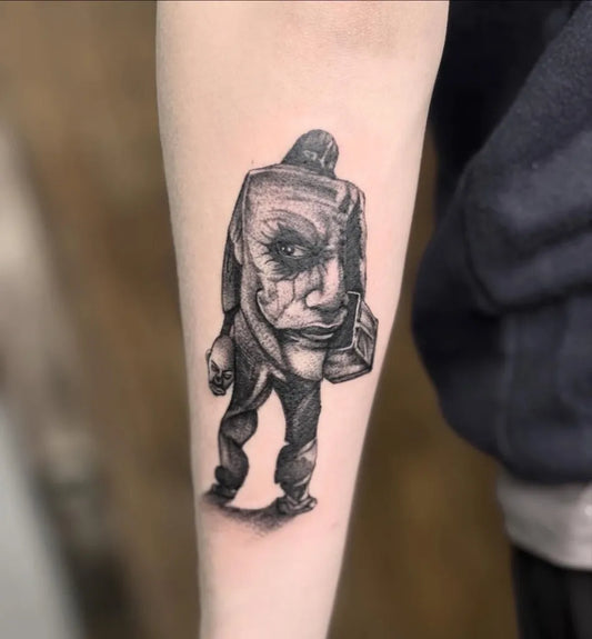 Medium Black and Grey Joker Figure on Men Arm Tattoo by @latatuaggeriadiambra