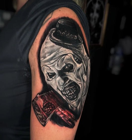Medium Black and Grey Joker Mask with Playing Cards Horror Tattoo on Women Arm by @paul_la_vey_tattoo