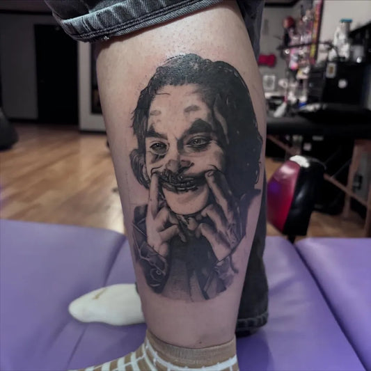 Medium Black and Grey Joker Portrait on Men Leg Tattoo by @gabbyrchavez