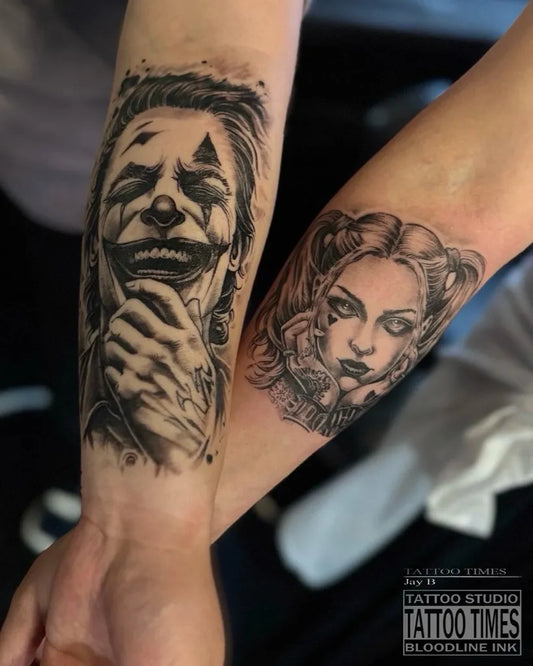 Medium Black and Grey Joker and Harley Quinn on Women Upper Arm Tattoo by @tattoo.times
