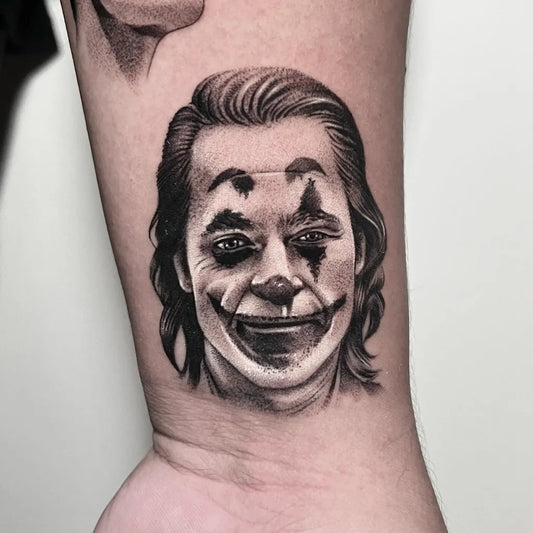 Medium Black and Grey Joker portrait on Men Forearm Tattoo by @jfrancistattoo