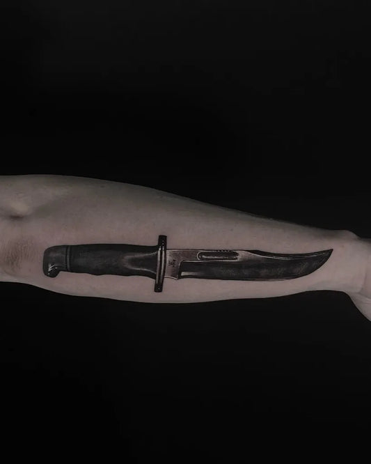 Medium Black and Grey Knife Tattoo on Men Arm by @allsacredtattoo