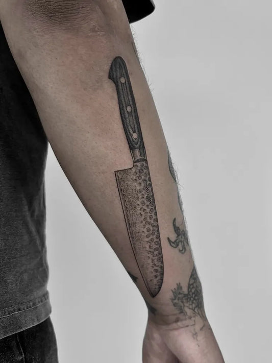 Medium Black and Grey Knife Tattoo on Men Arm by @philly.tattz