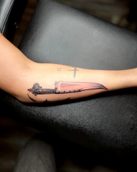 Medium Black and Grey Knife Tattoo on Women Arm by @sams.arrt