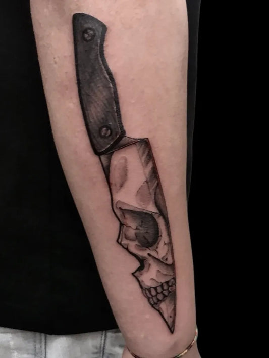 Medium Black and Grey Knife and Skull Tattoo on Men Arm by @kuroro17_tattooartist