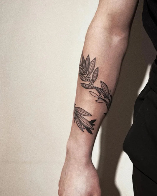 Medium Black and Grey Laurel Wreath Tattoo on Men Arm by @murikaz
