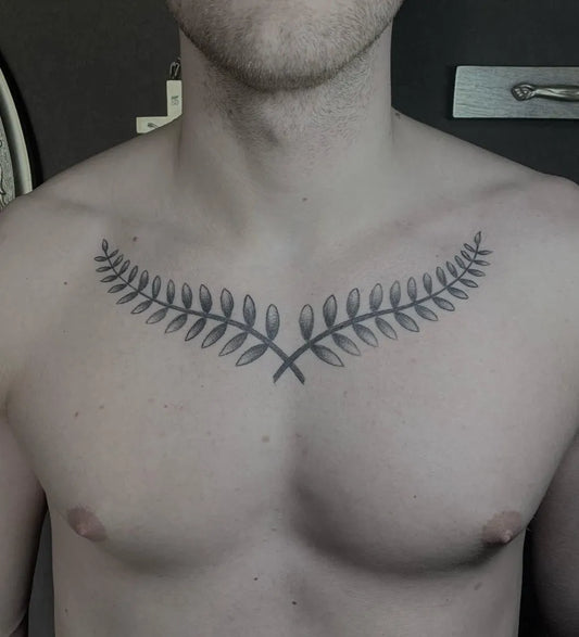 Medium Black and Grey Laurel Wreath Tattoo on Men Chest by @ae.tttoo