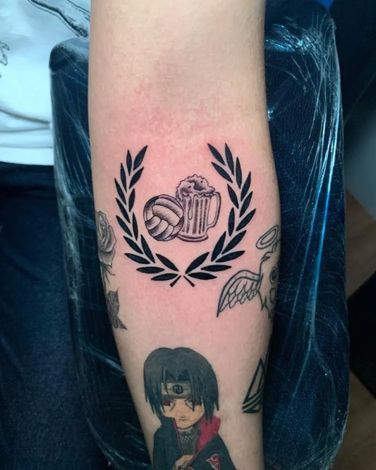 Medium Black and Grey Laurel Wreath Volleyball Beer Mug Tattoo on Men Arm by @o.a.k_art