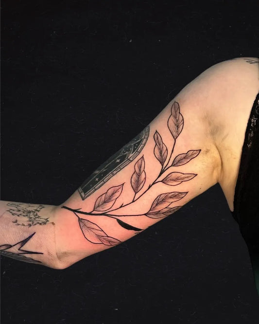 Medium Black and Grey Leaf Branch Tattoo on Women Inner Arm by @chuytatuy