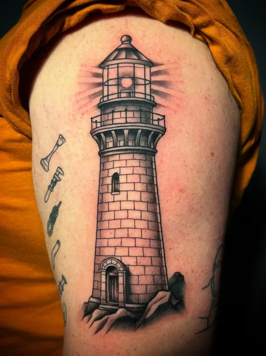 Medium Black and Grey Lighthouse with Anchor and Rope Tattoo on Men Arm by @mamunter