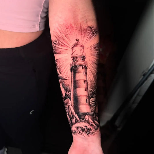 Medium Black and Grey Lighthouse with Rays Tattoo on Women Arm by @keegankeelitattoos