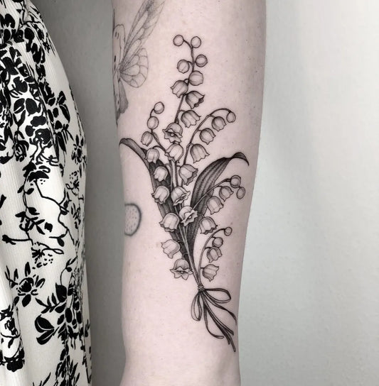 Medium Black and Grey Lily of the Valley Bouquet on Women Arm Tattoo by @laurazuffottt