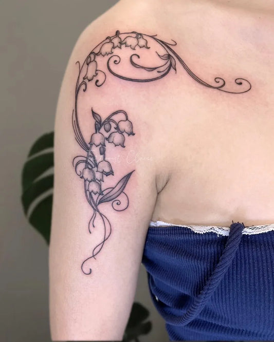 Medium Black and Grey Lily of the Valley Flowers and Vines on Women Shoulder Tattoo by @claire_tattoo
