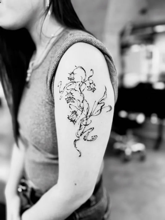 Medium Black and Grey Lily of the Valley Flowers on Women Arm Tattoo by @passthesaltbitch
