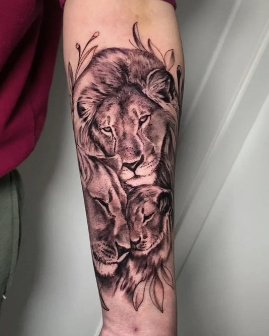 Medium Black and Grey Lion Family Tattoo on Women Arm by @ilariaarteria