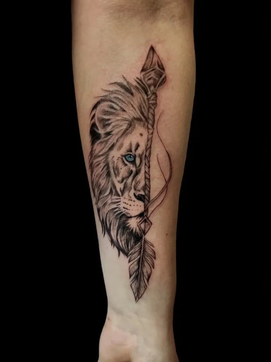 Medium Black and Grey Lion Feather on Men Arm Tattoo by @maca.tattoo.art