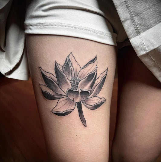 Medium Black and Grey Lotus Flower on Women Thigh Tattoo by @len.misfits