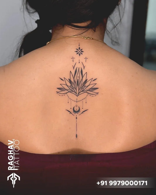 Medium Black and Grey Lotus Flower with Mandala on Women Back Tattoo by @gujju_tattoowala