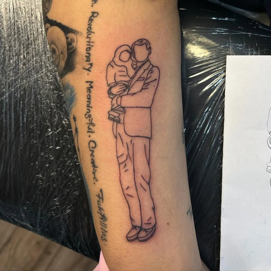 Medium Black and Grey Man and Child Family Tattoo on Men Arm by @tattsbymoni