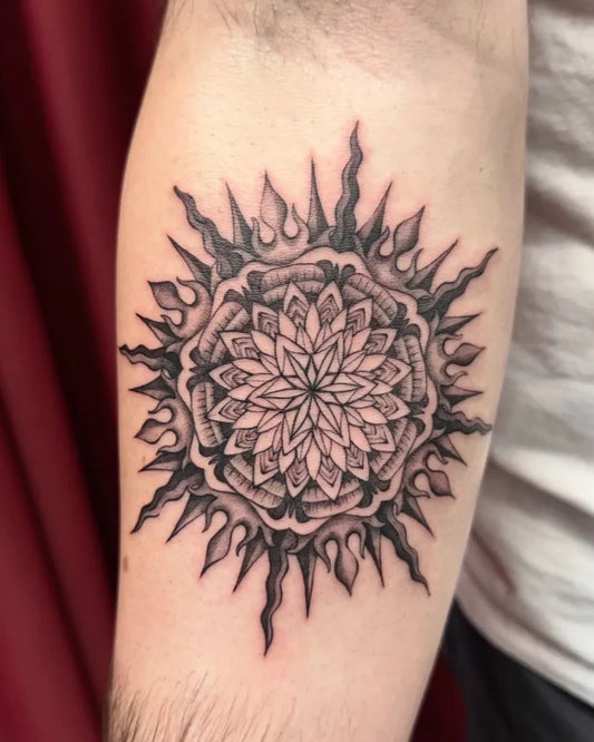 Medium Black and Grey Mandala Sun Tattoo on Men Arm by @molfar.tattoo