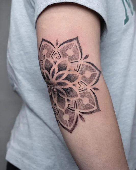 Medium Black and Grey Mandala Tattoo on Women Elbow by @sebastian_tattoo