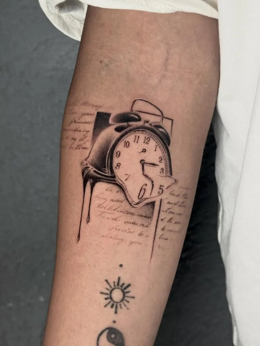 Medium Black and Grey Melting Clock with Script Tattoo on Men Arm by @temptink_tattoo_studio