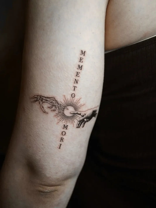 Medium Black and Grey Memento Mori Hands Sun on Women Arm Tattoo by @architex_tattoo