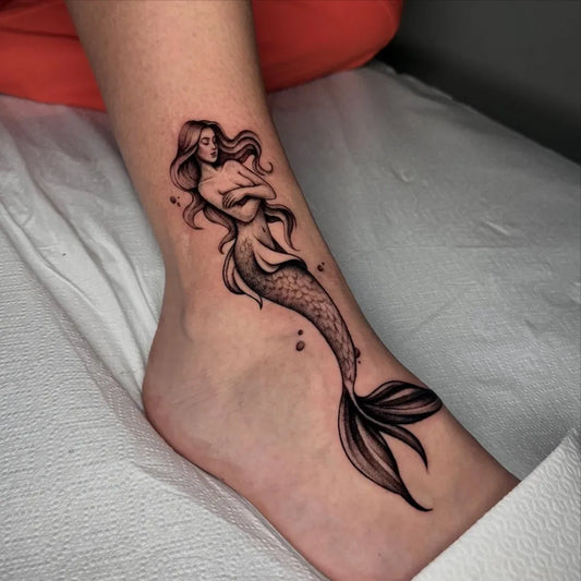 Medium Black and Grey Mermaid Tattoo on Women Leg by @alyss__tattoo