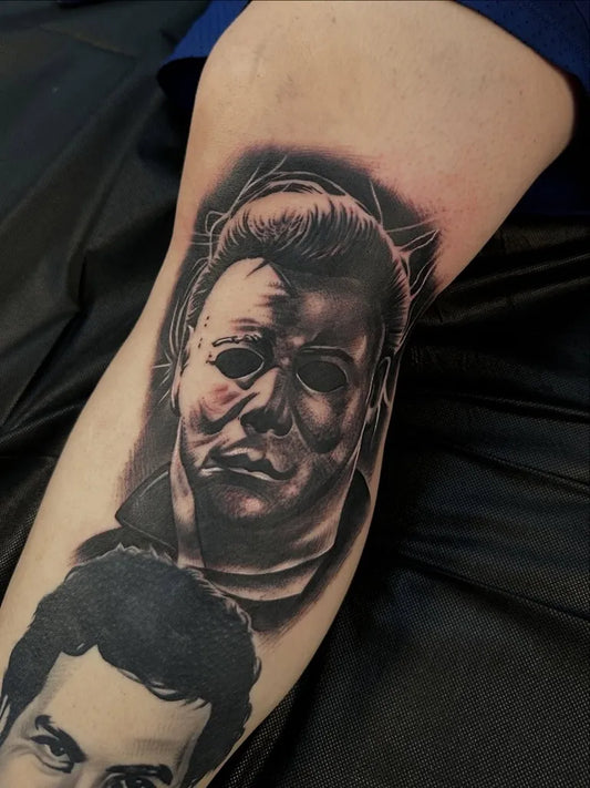 Medium Black and Grey Michael Myers Portrait Horror Tattoo on Men Arm by @thedansal