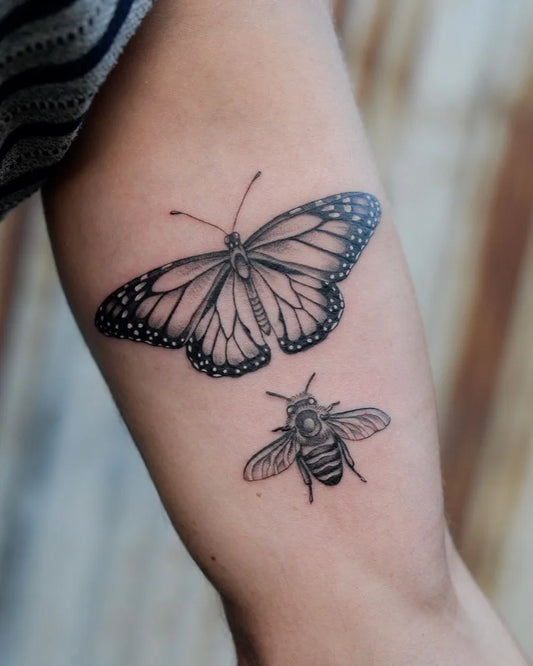 Medium Black and Grey Monarch Butterfly and Bee on Women Arm Tattoo by @julzktattoo