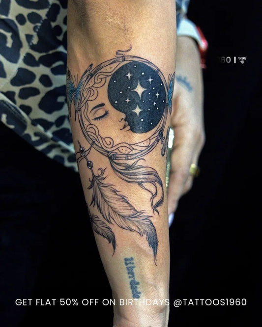 Medium Black and Grey Moon Dream Catcher Feathers Tattoo on Women Arm by @tattoos1960