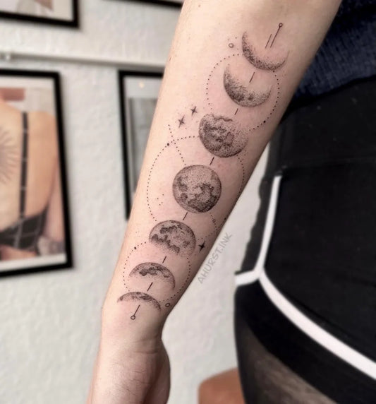 Medium Black and Grey Moon Phases Tattoo on Women Arm by @ahurst.ink