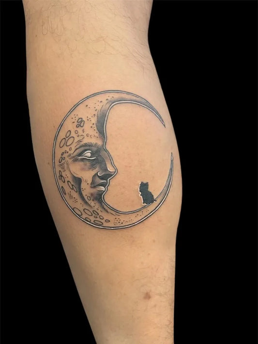 Medium Black and Grey Moon and Cat Tattoo on Women Arm by @eniana_karavoqiri