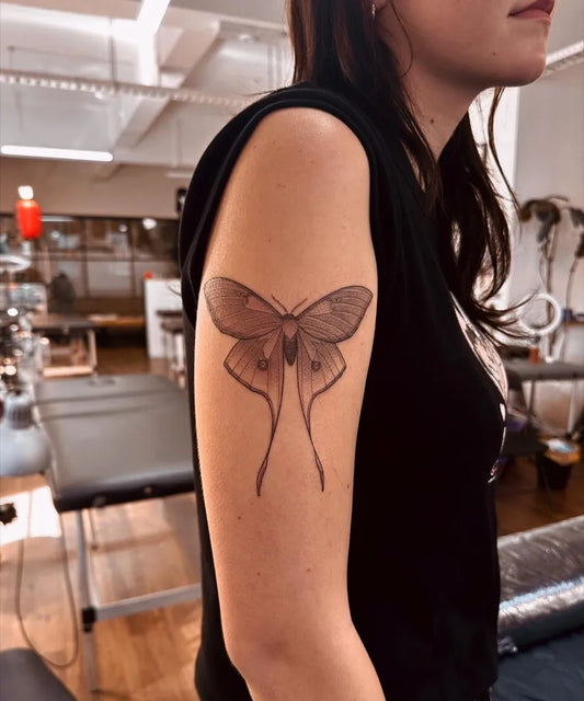 Medium Black and Grey Moth Spiritual Tattoo on Women Arm by @sarahpeteh