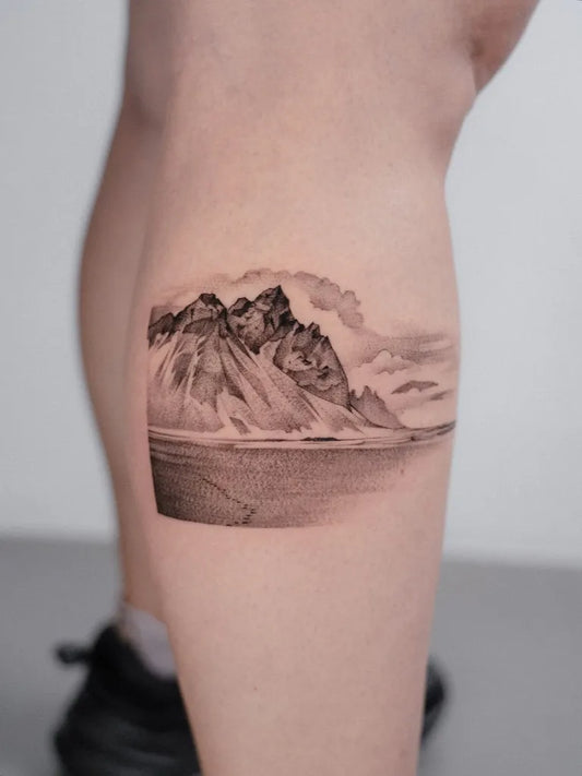 Medium Black and Grey Mountain Landscape Tattoo on Women Leg by @osmanergin_