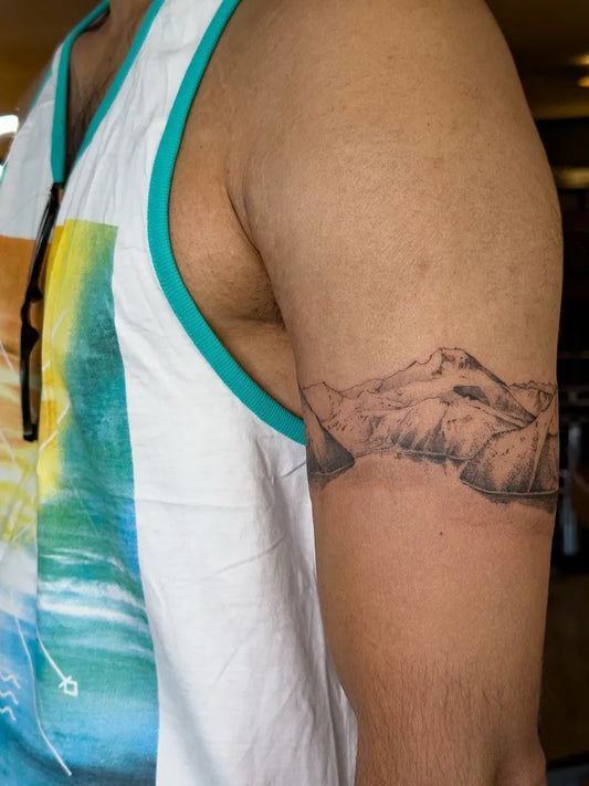 Medium Black and Grey Mountain Tattoo on Men Arm by @lukas.ejsmont